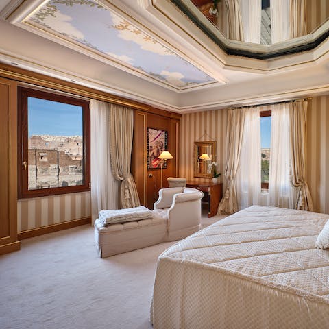 Wake up to historic panoramas in the sumptuous main bedroom 