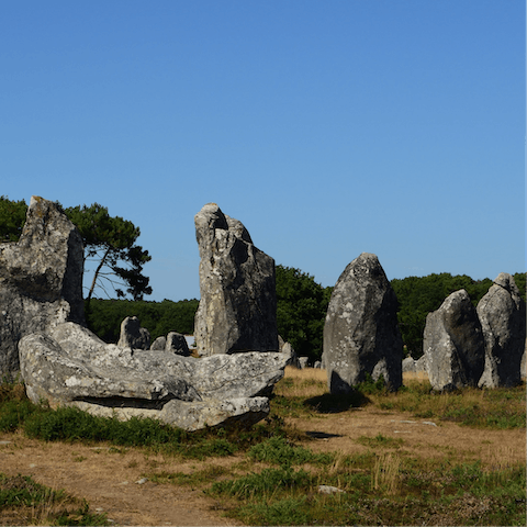 Take a seven-minute drive to visit the prehistoric Carnac Stones