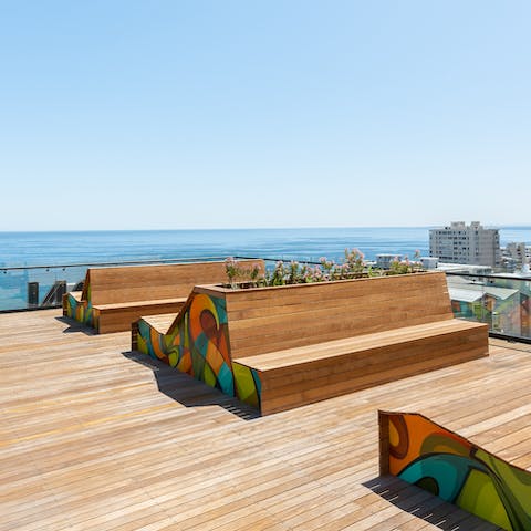 Enjoy a drink, and admire the coastal views, from the communal terrace