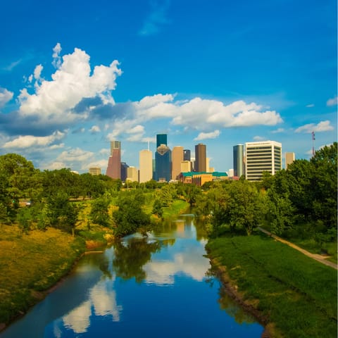 Follow the leafy riverside walk into the centre of Houston from your doorstep