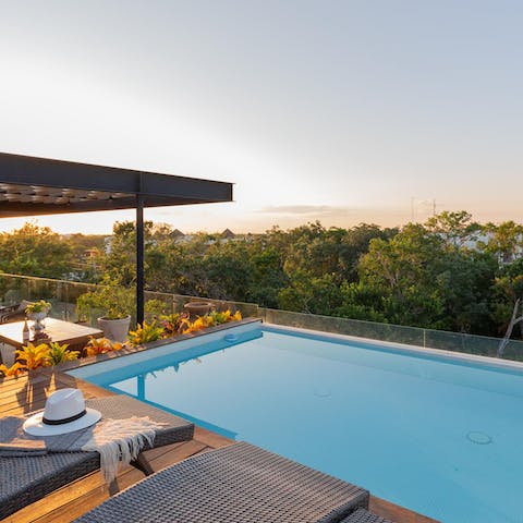 Lounge by your private pool or take a refreshing dip and marvel at the stunning views 