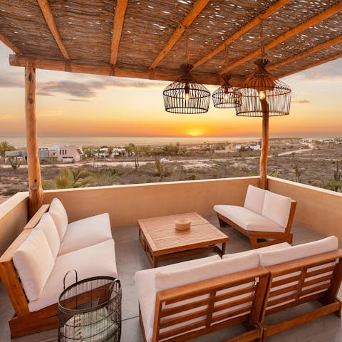 Share tequila on the rooftop terrace and watch the sunset over the sea