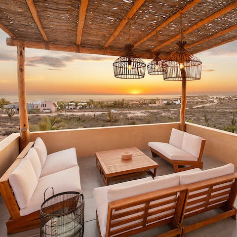 Share tequila on the rooftop terrace and watch the sunset over the sea