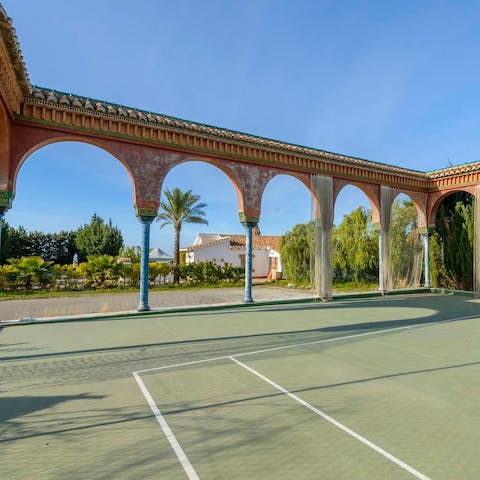 Play a few rounds of tennis on this one-of-a-kind arched court