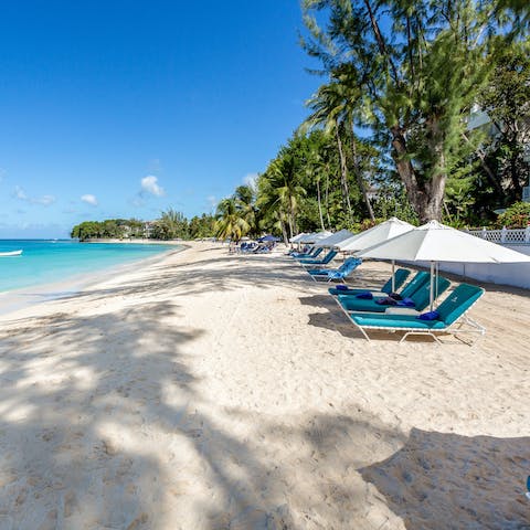 Follow the short path directly to Paynes Bay for relaxing beach days