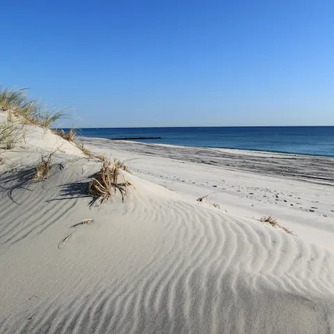 Wander the golden sands of East Hampton Beach, just over five minutes' drive away