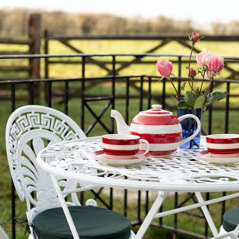 Enjoy a cup of tea in the garden, admiring the views