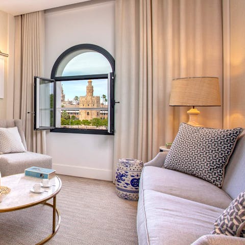 Take in the vistas of the Torre del Oro from the living room 