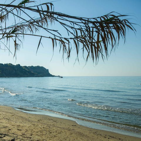 Spend an afternoon soaking up the sunshine on Kanouli Beach, 150 metres from your doorstep
