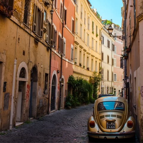 Explore the narrow, winding backstreets of Trastevere, just across the River Tiber