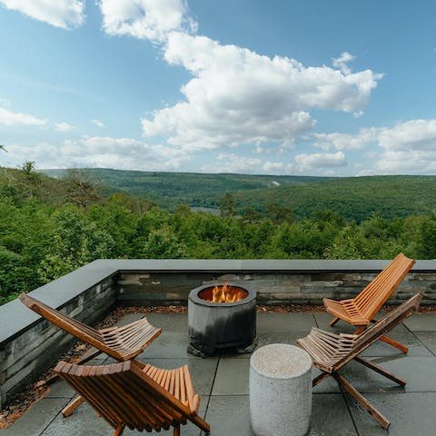 Sit around the fire pit and drink in the panoramic views