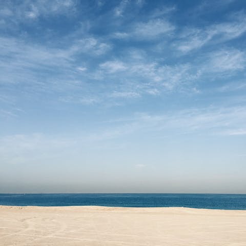 Step on the sands of FIVE Palm Jumeirah's private beach in a one-minute walk