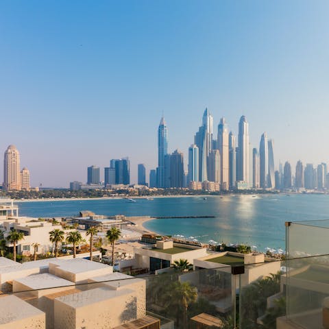 Witness stunning views of Dubai's skyline from the bedroom balconies