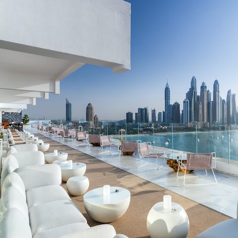 Gaze out at panoramic scenes of the Arabian Gulf from the communal terrace