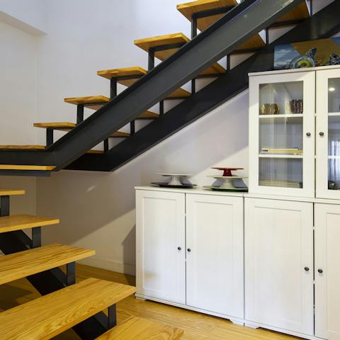 Admire the modern steel staircase