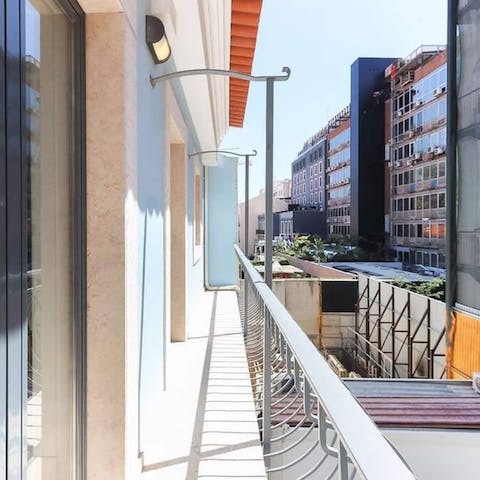 Get some fresh air on the traditional narrow balcony