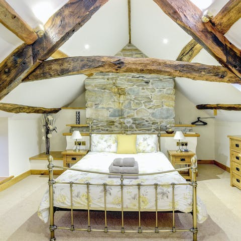 Sleep soundly under charming wooden beams