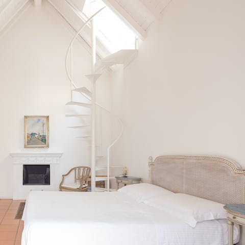 Clim the master bedroom's spiral staircase to peer out of the skylight