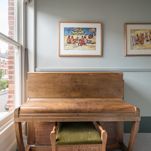 Practise your scales on the home's upright piano
