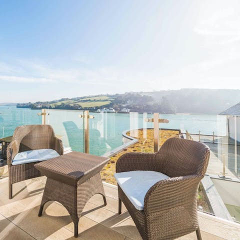 Soak up the panoramic views over the estuary from the private balcony