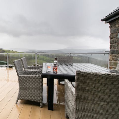 Savour a glass of wine from the welcome hamper as you relish the mountain vistas on the terrace