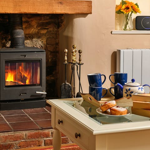 Put the kettle on and cosy up in front of the traditional wood burner
