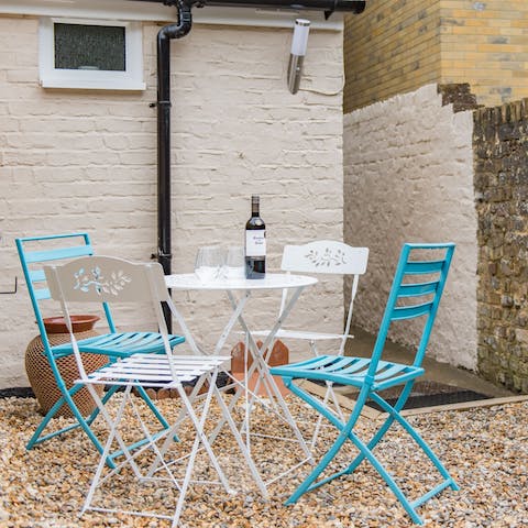 Share a bottle of wine in the garden when the sun comes out