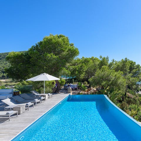 Cool down in the private pool with views of the bay