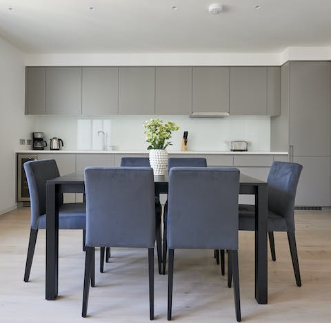 Prepare a meal in the sleek kitchen to enjoy at your dining table