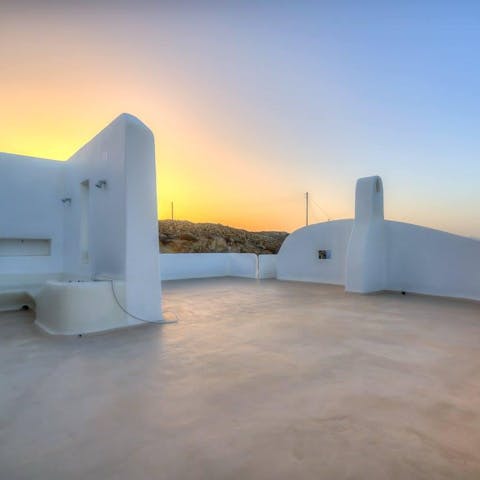Witness a stunning sunset from the rooftop terrace