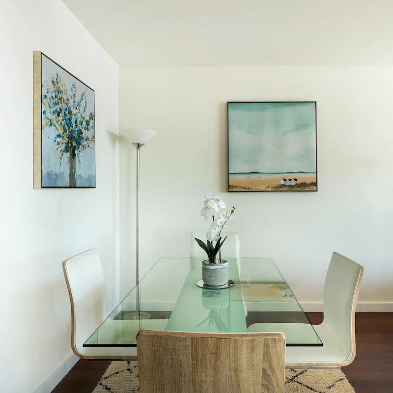 Serve home-cooked meals on the elegant glass table