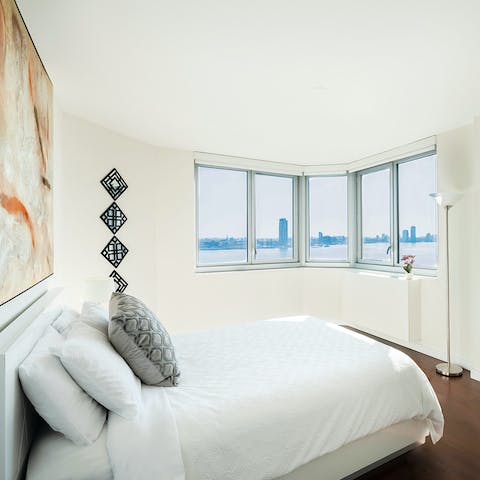 Wake up to epic views of New York City from bed