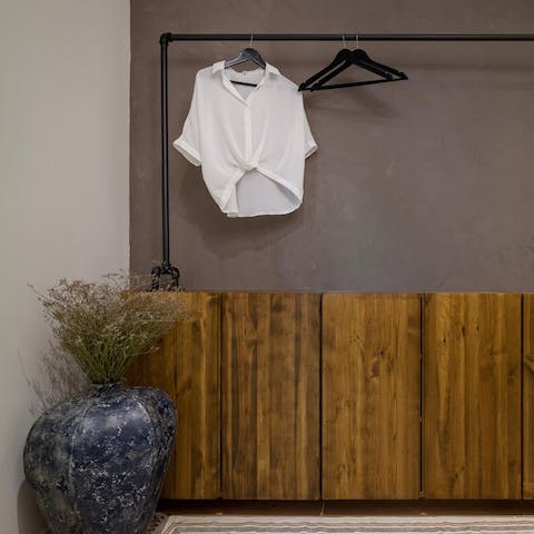 Curate your closet on the industrial-style rail