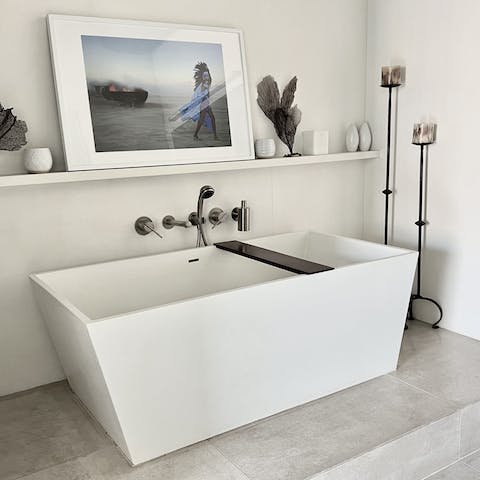 Treat yourself to a bubble bath in the freestanding tub