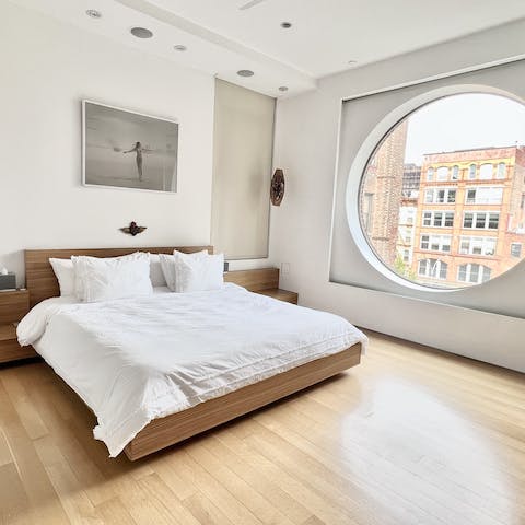 Wake up to views of the Empire State Building from your stylish bedroom window