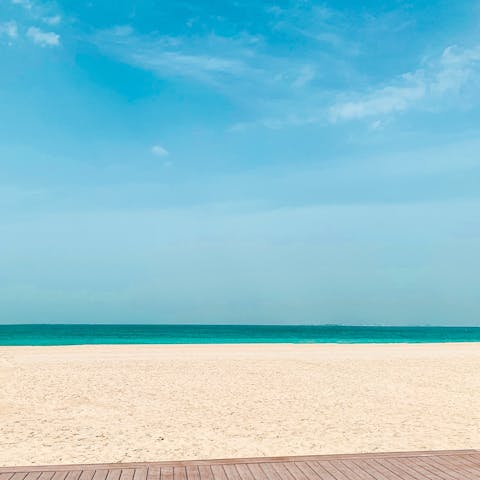 Spend a day on the sands of Jumeirah Beach, a short drive away