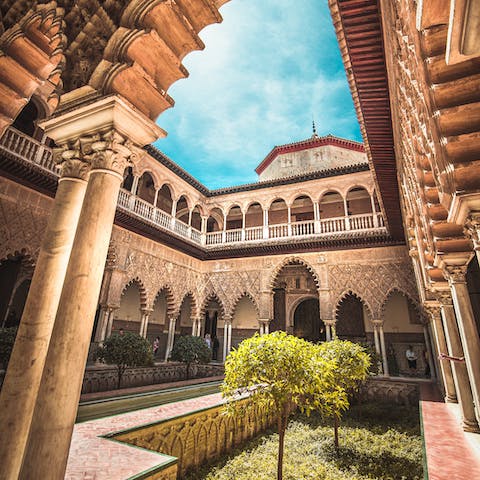 Visit the Royal Alcázar of Seville, 550 metres away