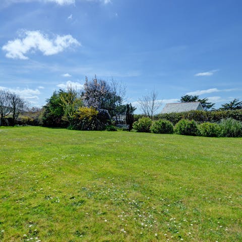 Make use of the huge garden by organising a game of rounders or football