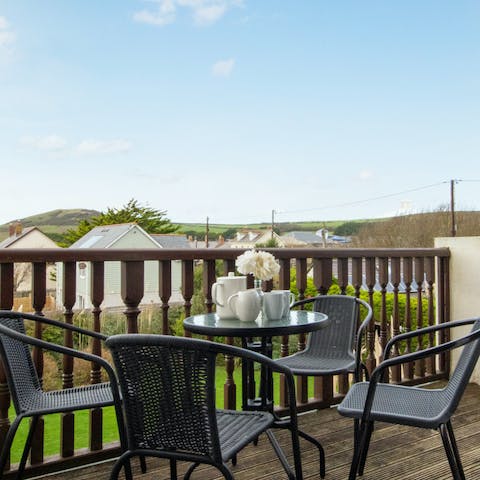 Enjoy a coffee out on your balcony, breathing in the fresh seaside air