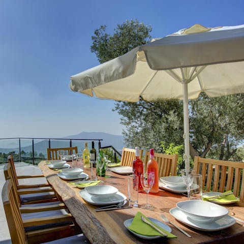 Dine alfresco on a sunny terrace, the perfect place to plan your adventures