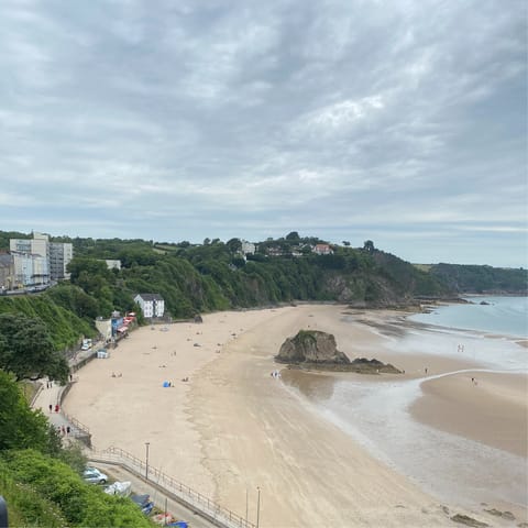 Sink your feet into the sand at Tenby's North beach