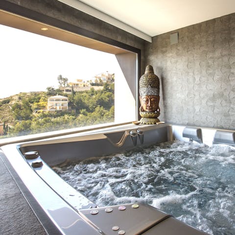 Watch the sun set from the perfectly positioned jacuzzi