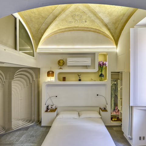 Drift off to sleep in the chapel-like bedroom