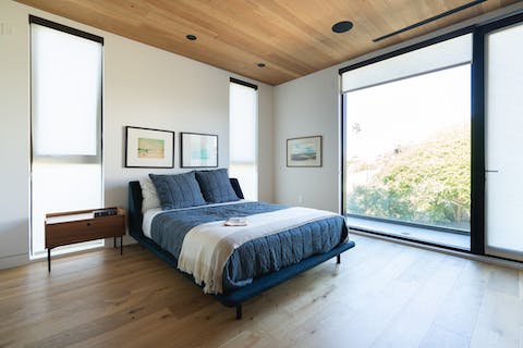 Wake up to views from the floor-to-ceiling windows 