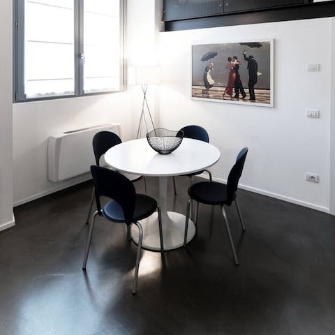 Set the table ready for breakfast in the bright dining area