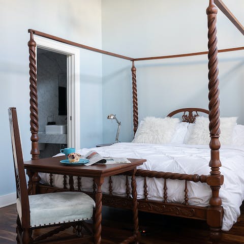 Sleep like royalty in the elegant four-poster bed