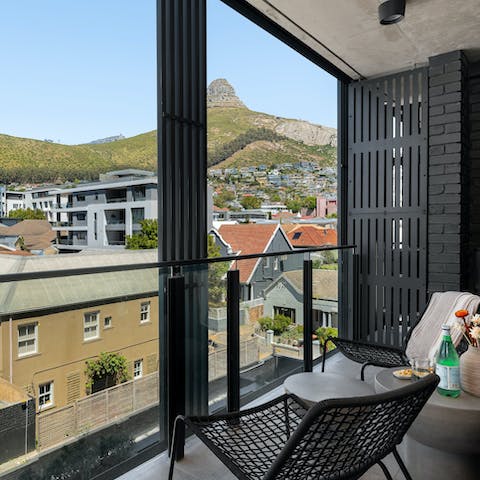 Take in the views of the Lion's Head from the private balcony 