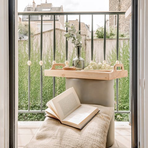 Step onto the small balcony to enjoy a breath of fresh air