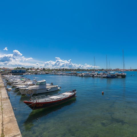 Stroll just 70 metres to the waterfront and watch the boats bob in the bay