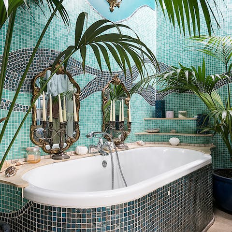 Get ready for the day in the tropical bathroom